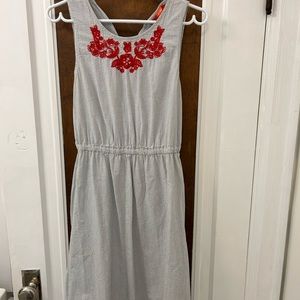 Blue striped dress with red detail. Pockets!